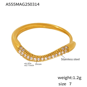 Detail view of gold wave ring with zircon inlay dimensions and material specifications