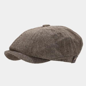 Classic herringbone newsboy hat in brown and beige with a vintage metal side button