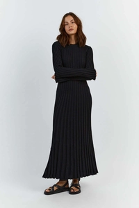 Elegant black long-sleeve knit maxi dress with vertical ribbed texture and slim-fit style