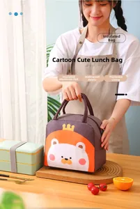 Detail of insulated lunch bag with thermal foil lining, waterproof fabric, and lion design