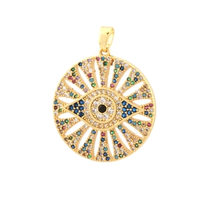 Macro shot of gold-plated evil eye pendant with colorful zirconia inlay and cut-out details