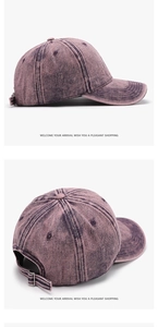 Detail view of purple washed denim baseball cap featuring metal buckle and stitching