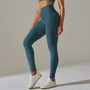 Vue latérale détaillée d'un legging de yoga sans couture bleu canard à taille haute