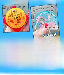 Detail of cute cartoon food microphone keychain with voice recording and sound effects