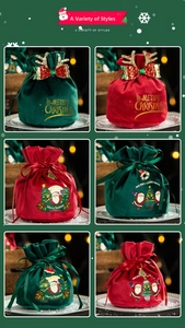 Detail of Christmas velvet drawstring gift bags in red and green with festive prints