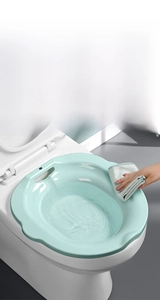 Vue détaillée du bidet vert menthe montrant le nettoyage facile de la surface lisse