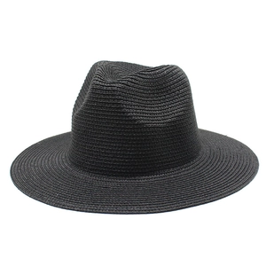 Dettaglio della trama intrecciata a spirale di un cappello da sole nero a tesa larga