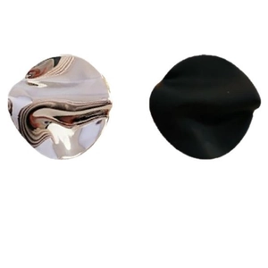 Asymmetric silver pleated metal round stud earrings with black matte finish detail