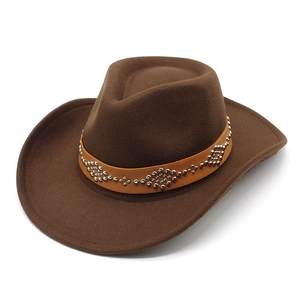 Classic brown felt western cowboy hat with decorative silver studded leather band on white