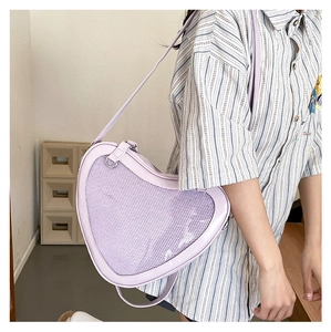 Detail of purple heart-shaped JK uniform bag with mesh window for ita bag display
