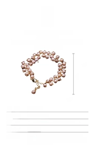 Detailed view of natural baroque pink freshwater pearls with 18K gold-plated clasp