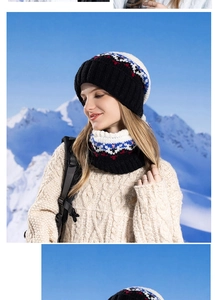 Detail of winter knitted hat and neck gaiter set with Fair Isle pattern on snowy mountain