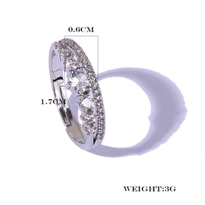 Detail showing 0.6cm width and 1.7cm inner diameter of the silver-toned rhinestone ring