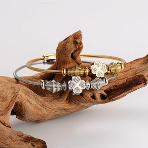 Gold and silver twisted steel wire magnetic clover bracelets with crystal inlay