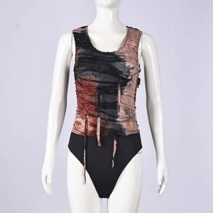 Detail of tie-dye drawstring bodysuit featuring sleeveless U-neck and ruched fabric texture