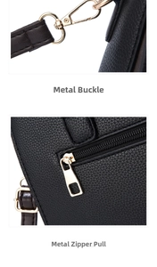 Detail of golden hardware clasp and metal zipper pull on black litchi grain leather bag