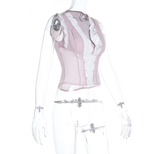 Detailed view of pink chiffon top with lace trim and adjustable drawstring front ties