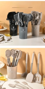 Detail of 14-piece silicone cooking utensils with stainless steel handles in storage bucket