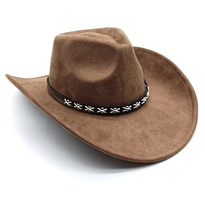 Detail of dark brown faux suede cowboy hat featuring white cross-stitch leather band
