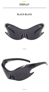 Detail view of black futuristic Y2K sunglasses showing the frame and side profile