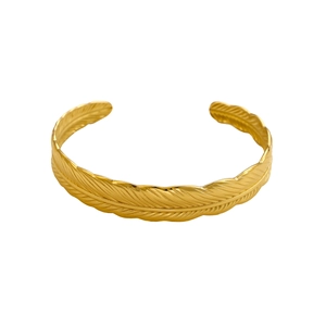 Polished gold feather open cuff bracelet with detailed metal texture on white background