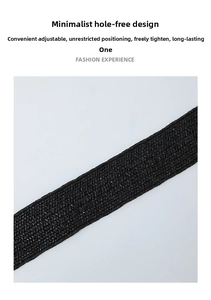 Detail of black elastic woven belt with resin buckle showing adjustable design