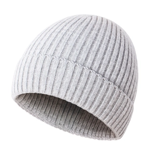Detail of light grey baby knit beanie showing soft ribbed texture and folded cuff edge