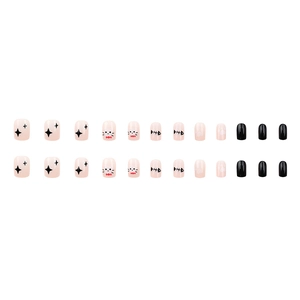 Short square press-on nails with cute cat and fishbone doodles in pink and black