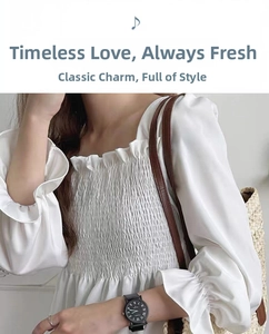 Detail of white ruffled square neck blouse with smocking craftsmanship and long sleeves
