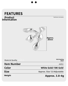 Detail of irregular hollow design ring with 18K gold and silver finishes in S925 silver