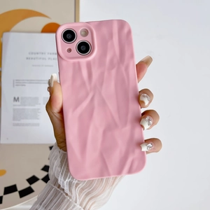 Pink wrinkled silicone case for iPhone with protective soft texture in hand detail view