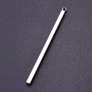 Macro shot of a silver rectangular 304 stainless steel bar pendant with top ring