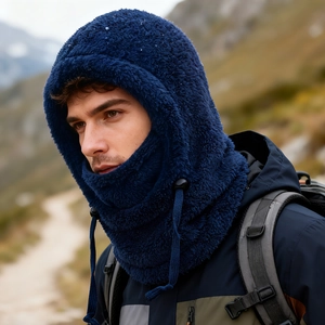 Detail of dark blue balaclava mask showing soft plush texture and adjustable drawstrings