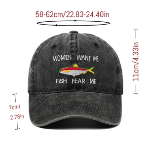 Close-up of fishing embroidery with size dimensions on washed black baseball cap