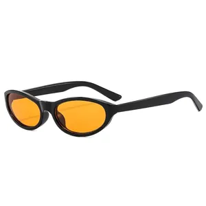 Retro small cat eye sunglasses with glossy black frames and bright orange lenses