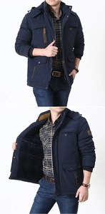 Detail of navy parka lining with warm fleece and durable zipper closure