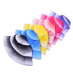 Outdoor bucket hats in colorful gradient patterns including blue, pink, and yellow options