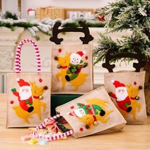 Christmas striped linen gift bags with Santa and reindeer 3D dolls for holiday candy treats