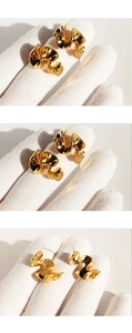 Three-angle views showing gold twisted wave earrings held in hand with sunlight shadows