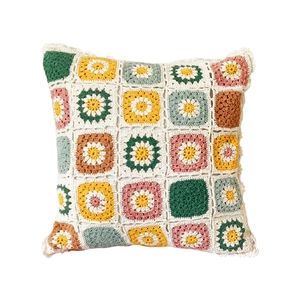 Handmade granny square crochet pillow cover with colorful floral daisy pattern