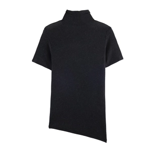 Detail of black turtleneck short sleeve top with unique asymmetric slanted hem design
