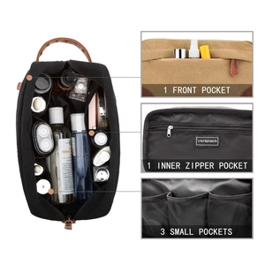 Detailed view of internal pockets in a canvas toiletry bag with multiple storage sections.