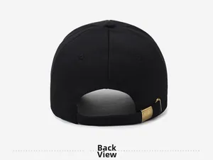 Rear view of black baseball cap showing the adjustable brass metal buckle and canvas texture