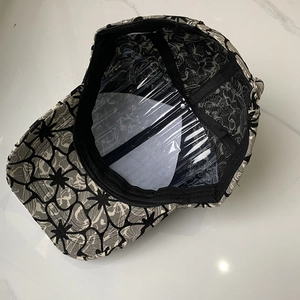 Detailed interior view of floral baseball cap showing high-quality canvas fabric and lining