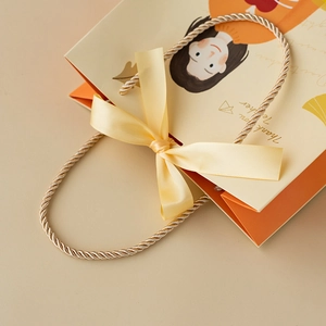 Premium Thank You Teacher gift bag with cartoon illustration and silk bow detail