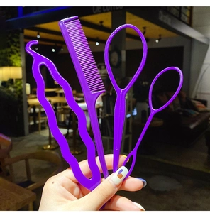 Detail of 4-piece purple hair styling tool set including tail comb and pulling loops