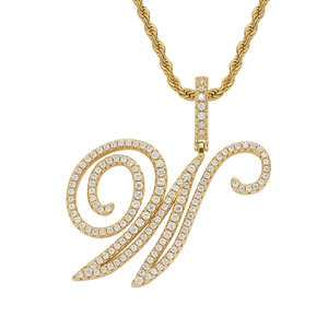 Detail of 18K gold letter W pendant with micro-pave zircons and thick rope chain
