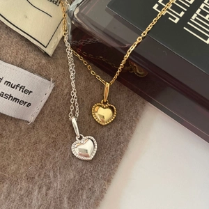 Minimalist 925 sterling silver necklaces with gold and silver heart pendants in luxury setting
