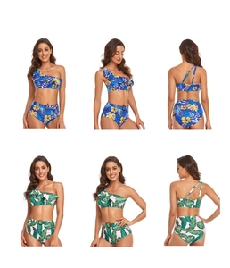 Detail view of one-shoulder bikini sets with tropical floral prints and ruffle trim