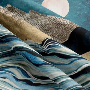 Close-up of soft mountain tapestry fabric with high density moon and rock prints
